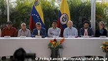 CARACAS, VENEZUELA - DECEMBER 12: Colombia's National Liberation Army (ELN) guerrilla commanders Aureliano Carbonell (2nd L) and Pablo Beltran (3rd L) meet with the Colombian government delegation members, peace commissioner Danilo Rueda (C), Otty Patino (3rd R), and Ivan Cepeda (2nd R) during the closing of peace talks in Caracas, Venezuela on December 12, 2022. The Colombian government and the National Liberation Army (ELN) guerrillas closed the first round of peace talks in Caracas on Monday, announcing the release of hostages and humanitarian actions, but without agreeing to a ceasefire. Pedro Rances Mattey / Anadolu Agency