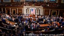Members walk on the House floor in the House chamber during a roll call vote on the motion to adjourn as the House meets for a second day to elect a speaker and convene the 118th Congress in Washington, Wednesday, Jan. 4, 2023. (AP Photo/Andrew Harnik)