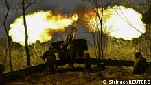 A Ukrainian serviceman fires with a 2A65 Msta-B howitzer towards Russian troops, amid Russia's attack on Ukraine, in a frontline in Zaporizhzhia region, Ukraine January 5, 2023. REUTERS/Stringer