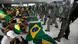 Bolsonaro supporters sit in front of police officers at Palacio do Planalto Bolsonaro supporters sit in front of police officers at Palacio do Planalto