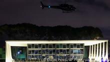 08.01.2023
A Police helicopter flies over the Planalto Palace after it was stormed and vandalized by supporters of Brazil's former President Jair Bolsonaro in Brasilia, Brazil, Sunday, Jan. 8, 2023. Protesters who refuse to accept BolsonaroÂ´s election defeat stormed Congress, the Supreme Court and presidential palace in the capital, a week after the inauguration of his rival, President Luiz Inacio Lula da Silva. (AP Photo/Eraldo Peres)