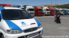 This picture shows trucks from a United Nations aid convoy after entering Syria through the Bab al-Hawa border crossing with Turkey, carrying basic vital necessities for the inhabitants of the northwestern rebel-held areas on the country, on July 28, 2022, after the decision to extend the authorisation mechanism” across the border. - The aid delivery mechanism across Turkey's border into rebel-held Syria at the Bab al-Hawa crossing is the only way UN assistance can reach civilians without navigating areas controlled by Syrian government forces. (Photo by OMAR HAJ KADOUR / AFP)