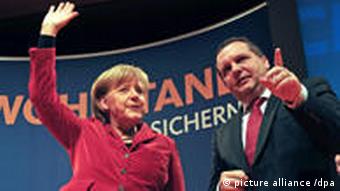 Baden-Württembergs Ministerpräsident Stefan Mappus mit Angela Merkel