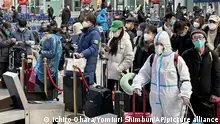 Passengers gather at Beijingnan Railway Station to use High-Speed Railway in Beijing on Jan. 8, 2023. ( The Yomiuri Shimbun via AP Images )