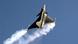 A fighter jet in the sky A fighter jet in the sky