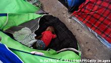 TOPSHOT - A child sleeps in a tent as they live with their family in the Movimiento Juventud 2000 shelter with refugee migrants from Central and South American countries including Honduras and Haiti seeking asylum in the United States, as Title 42 and Remain In Mexico border restrictions continue, in Tijuana, Baja California state, Mexico on April 9, 2022. - Thousands of Latino refugees arrive in the Mexican city of Tijuana each year, dreaming of one day crossing the border that separates them from the United States. But as Ukrainians who fled Russia's invasion have recently begun to cross the same frontier with little delay, many Latinos stuck waiting for months are wondering why they are not being treated the same.
Why are we -- neighbors of the United States -- not given the same opportunity to seek asylum? We came here fleeing almost the same thing, said L., a 44-year-old Mexican man. (Photo by Patrick T. FALLON / AFP) (Photo by PATRICK T. FALLON/AFP via Getty Images)