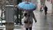 An woman walks with an umbrella through snowy Tehran in January 2023 An woman walks with an umbrella through snowy Tehran in January 2023