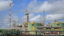 General view of the Staatsolie refinery owned by Suriname State Oil Company in Wanica, Suriname, on September 26, 2022. - Emerging as potential oil powers while the world seeks to wean itself off planet-warming fossil fuels, poverty-striken South American neighbors Guyana and Suriname say they have no choice but to cash in while they can. (Photo by Ranu Abhelakh / AFP)