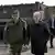 Waleri Gerassimow in Uniform, Wladimir Putin im schwarzen Mantel