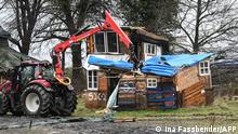 12.01.2023****A wooden house by environmentalists is torn down in the village of Luetzerath, western Germany, on January 12, 2023, as the evacuation continues of anti-coal activists staging an 'active defence' of the village, ahead of a planned demolition to expand a coal mine. - German police pressed ahead with clearing a camp of anti-coal activists in the abandoned town of Luetzerath which has become emblematic of the country's struggle to transition away from fossil fuels amid an energy crisis. Once numbering as many as 2,000, around 200 anti-coal activists remain in the village, which has been slated for demolition to enable the expansion of the neighbouring Garzweiler coal mine. (Photo by INA FASSBENDER / AFP)