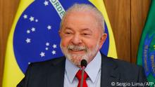 Brazilian President Luiz Inacio Lula da Silva gestures during a breakfast with accredited journalists at the Planalto Palace in Brasilia on January 12, 2023. (Photo by Sergio Lima / AFP)