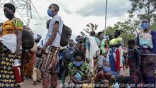 Thursday, Aug. 27, 2020+++Burundian refugees from Mahama camp in Rwanda arrive back in Gasenyi, Burundi, Thursday, Aug. 27, 2020. Nearly 500 Burundian refugees living in Rwanda began their journey back to their home country Thursday, the first group to return from Rwanda after five years in exile following deadly political violence that sent many fleeing. (AP Photo/Berthier Mugiraneza)