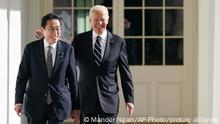 President Joe Biden and Japanese Prime Minister Fumio Kishida walk along the Colonnade of the White House, Friday, Jan. 13, 2023, in Washington. (Mandel Ngan/Pool Photo via AP)