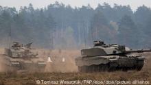 16/10/2015 epa04979772 British Army FV4034 Challenger 2 battle tanks are seen during the North Atlantic Treaty Ogranization NATO military exercise 'Dragon-15' at the Land Forces Training Centre 'Orzysz' in the Bemowo Piskie village, Masuria region, Poland, 16 October 2015. About 7,000 soldiers from Poland, the United States, Canada, Germany and Britain with some 700 tanks and fighting vehicles along with Polish reservists and volunteers from the National Reserve Forces take part in the largest military maneuvers in Poland in 2015. The exercises of the allied forces are to train deter aggression and counterattack, equipped with heavy weaponry including 'Leopard' tanks, 'Rosomak' armoured vehicles, 'Dana' self-propelled howitzers and the 'Langusta' self-propelled multiple rocket launcher. The Dragon-15 exercise will run until 23 October. EPA/TOMASZ WASZCZUK POLAND OUT ++