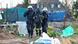 Two police escort climate activist away from site in Lützerath village Two police escort climate activist away from site in Lützerath village