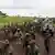 Demokratische Republik Kongo | Soldaten der EACRF und M23 Rebellen in Kibumba