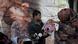 A health worker administers a polio vaccine to a child in Lahore, Pakistan A health worker administers a polio vaccine to a child in Lahore, Pakistan