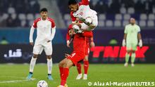 Soccer Football - Arabian Gulf Cup25 - Semi Final - Bahrain v Oman - Al-Minaa Olympic Stadium, Basra, Iraq - January 16, 2023
Oman's Jameel Al-Yahmadi in action with Bahrain's Sayed Dhiya Saeed REUTERS/Alaa Al-Marjani