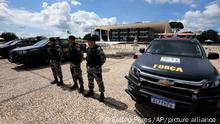 Military police stand guard outside the Supreme Court in Brasilia, Brazil, Wednesday, Jan. 11, 2023, ahead of expected protests called for by supporters of former Brazilian President Jair Bolsonaro. (AP Photo/Eraldo Peres)