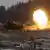 Украинский танк стреляет по российским позициям около Кременной в Луганской области, 12 января