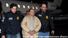 FILE - In this Jan. 19, 2017 file photo provided U.S. law enforcement, authorities escort Joaquin El Chapo Guzman, center, from a plane to a waiting caravan of SUVs at Long Island MacArthur Airport, in Ronkonkoma, N.Y. A U.S. jury is set to hear closing arguments on Wednesday, Jan. 30, 2019 in Guzman's high-profile drug trafficking trial. (U.S. law enforcement via AP, File)