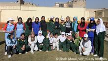 ARCHIV 04.01.2011+++ TO GO WITH Lifestyle-Afghanistan-women-cricket,FEATURE by Katherine Haddon In this photograph taken on January 4, 2011, members of Afghanistan's first national women's cricket team pose for a group photo on the sidelines of a training session in Kabul. The team, many of whom play in headscarves, will compete against other female sides from across Asia in a Twenty20 tournament in Kuwait in February. AFP PHOTO / SHAH Marai (Photo credit should read SHAH MARAI/AFP via Getty Images)