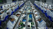 SHENZHEN, CHINA -SEPTEMBER 24: Workers make pods for e-cigarettes on the production line at Kanger Tech, one of China's leading manufacturers of vaping products, on September 24, 2019 in Shenzhen, China. Global production for e-cigarette and vaping products is centered in a five-square-mile district of Shenzhen, China, which is the focal point for roughly 90% of the industrys supply chain. Hundreds of companies in China ranging from large corporations to smaller workshops -- are vying for a part of the international market for e-cigarette and vaping products industry worth an estimated $15 billion USD. With investigations by U.S. health officials into an outbreak of vaping-related illnesses across more than 30 states, there are new concerns about product safety, health effects, and addiction among young people. Chinas government is drafting new standards for manufacturing, safety, and quality control. The regulations are likely months away from taking full effect, though most established e-cigarette manufacturers in China already employ strict quality controls that comply with U.S. and European standards. Still, a growing number of U.S. states, including New York and New Jersey, are moving to ban certain vaping products and electronic smoking devices. Many of the firms are seeking to make inroads into the potentially lucrative Chinese market, where reports say more than 60 percent of adult males smoke. (Photo by Kevin Frayer/Getty Images)