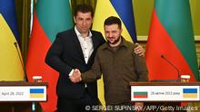 Ukrainian President Volodymyr Zelensky (R) shakes hands with Prime Minister of Bulgaria Kiril Petkov following their press conference in Kyiv on April 28, 2022. (Photo by Sergei SUPINSKY / AFP) (Photo by SERGEI SUPINSKY/AFP via Getty Images)