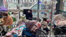 FILE PHOTO: Patients lie on beds in the emergency department of a hospital, amid the coronavirus disease (COVID-19) outbreak in Shanghai, China, January 5, 2023. REUTERS/Staff/File Photo