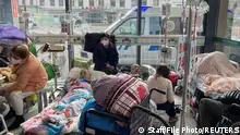FILE PHOTO: Patients lie on beds in the emergency department of a hospital, amid the coronavirus disease (COVID-19) outbreak in Shanghai, China, January 5, 2023. REUTERS/Staff/File Photo