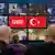 A computer screen shows the Turkish flag at CeBIT
