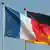 Знамената на Франция и Германия се веят в небето