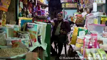 An Egyptian seller waits for customers to buy consumer goods, rice and oil at a popular market in Cairo, Egypt, January 18, 2023. REUTERS/Hadeer Mahmoud NO RESALES. NO ARCHIVES