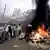 The riots began after a train fire killed 60 Hindu pilgrims