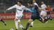 Real Madrid's Mesut Özil, left, competes for the ball with Lyon's Jeremy Toulalan Real Madrid's Mesut Özil, left, competes for the ball with Lyon's Jeremy Toulalan