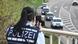 File photo of a police officer recording drivers' speed File photo of a police officer recording drivers' speed