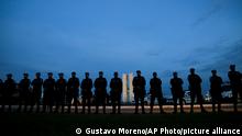 11.01.2023
Military police stand in front of the National Congress building during an abortive protest announced by supporters of former President Jair Bolsonaro, in Brasilia, Brazil, Wednesday, Jan. 11, 2023. Despite being widely announced by social media, the protests did not take place and did not have supporters of the former president. (AP Photo/Gustavo Moreno)