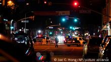 Police investigate a scene where a shooting took place in Monterey Park, Calif., Sunday, Jan. 22, 2023. Dozens of police officers responded to reports of a shooting that occurred after a large Lunar New Year celebration had ended in a community east of Los Angeles late Saturday. (AP Photo/Jae C. Hong)