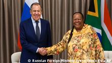 In this photo released by the Russian Foreign Ministry Press Service, Russia's Foreign Minister Sergey Lavrov, left, and his South Africa's counterpart Naledi Pandor pose for a photo prior to their talks in Pretoria, South Africa, Monday, Jan. 23, 2023. (Russian Foreign Ministry Press Service via AP)
