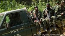  211212 -- , Dec. 12, 2021 -- Soldiers are seen on a military vehicle during a joint military operation against armed forces in Beni territory, northeastern Democratic Republic of the Congo, Dec. 11, 2021. The Armed Forces of the Democratic Republic of the Congo FARDC and Uganda People s Defense Force UPDF on Saturday released the first assessment of their joint military operations against rebels of the Allied Democratic Forces ADF, conducted since Nov. 30 in Beni territory, northeastern DRC. TO GO WITH: DR Congo, Uganda declare calm situation in northeastern DRC following assessment of joint military operations Photo by /Xinhua DR CONGO-BENI-FRONTLINE-OPERATION AlainxUaykani PUBLICATIONxNOTxINxCHN