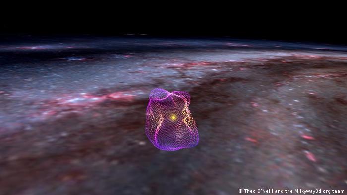 La Burbuja Local sobre un fondo de la Vía Láctea. Las líneas vectoriales rosas y moradas de la superficie de la burbuja representan las orientaciones de los campos magnéticos. 
