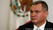 FILE - Mexico's Secretary of Public Safety Genaro Garcia Luna attends a press conference on the sidelines of an American Police Community meeting in Mexico City, Oct. 8, 2010. An anonymous jury has gotten its first look at a rare U.S. trial of a former cabinet-level Mexican official charged with taking bribes to aid drug traffickers he was supposed to be neutralizing. (AP Photo/Marco Ugarte, File)