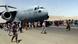 Hundreds of people run alongside a U.S. Air Force C-17 transport plane as it moves down a runway of the international airport, in Kabul, Afghanistan, Monday, Aug.16. 2021. Hundreds of people run alongside a U.S. Air Force C-17 transport plane as it moves down a runway of the international airport, in Kabul, Afghanistan, Monday, Aug.16. 2021.