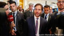 Uruguay's President Luis Lacalle Pou walks to attend a news conference at the 7th Heads of State and Government Summit of the Community of Latin American and Caribbean States (CELAC), in Buenos Aires, Argentina, January 24, 2023. REUTERS/Agustin Marcarian
