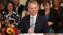 New Zealand's new Prime Minister Chris Hipkins smiles as he is sworn in by Governor General Dame Cindy Kiro during a ceremony at The Government House in Wellington on January 25, 2023. - Jacinda Ardern was officially replaced on January 25 as New Zealand prime minister, after stunning the country by announcing her abrupt departure from the role last week.
New Prime Minister Chris Hipkins, 44, was sworn in by New Zealand's governor-general during a ceremony in the capital, Wellington. (Photo by Marty MELVILLE / AFP) (Photo by MARTY MELVILLE/AFP via Getty Images)