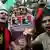 مخالفان قذافی در سراسر جهان تظاهرات کردند. اینجا در برابر سفارت لیبی در مالزی