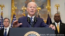 President Joe Biden speaks about Ukraine from the Roosevelt Room at the White House in Washington, Wednesday, Jan. 25, 2023, as Secretary of State Antony Blinken, left, and Defense Secretary Lloyd Austin listen. (AP Photo/Susan Walsh)