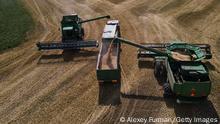 05.08.2022
KHMELNYTSKYI, UKRAINE - AUGUST 05: A combine harvesters of Astarta-Kyiv agri-industrial holding unloads wheat into a truck on August 5, 2022 in the Khmelnytskyi region of Ukraine. In normal times, Ukraine is one of the world's largest grain exporters, but the Russian invasion and naval blockade has trapped millions of metric tons of grains here, raising fears of a global food crisis. On Monday, a ship full of corn was the first such vessel to leave Ukraine's southern port of Odessa following a deal brokered by Turkey and the United Nations, to ensure the safe passage of grain to foreign ports. (Photo by Alexey Furman/Getty Images)