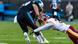 Partido de los Carolina Panthers, en uniforme azul oscuro Partido de los Carolina Panthers, en uniforme azul oscuro