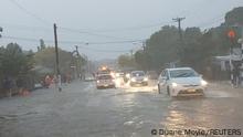 A general view of a flooded street after Elton John’s concert was canceled due to bad weather, in Auckland, New Zealand, January 27, 2023 in this screen grab obtained from a social media video. Duane Moyle/via REUTERS THIS IMAGE HAS BEEN SUPPLIED BY A THIRD PARTY. MANDATORY CREDIT. NO RESALES. NO ARCHIVES.
